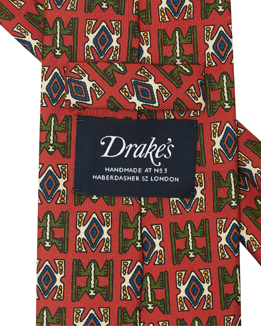 Herre | Drake's Silk Printed Native Pattern 8 cm Tie Dusty Red | Drake's | Silk Printed Native Pattern 8 cm Tie Dusty Red