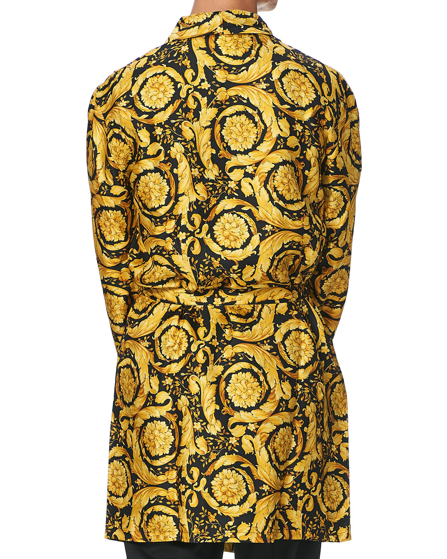 gold and black versace robe