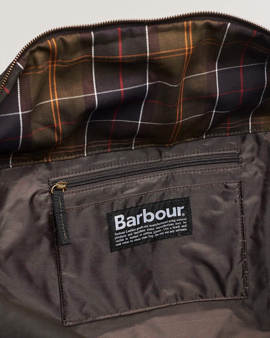 Shop the Barbour Explorer Wax Duffle Bag in Olive