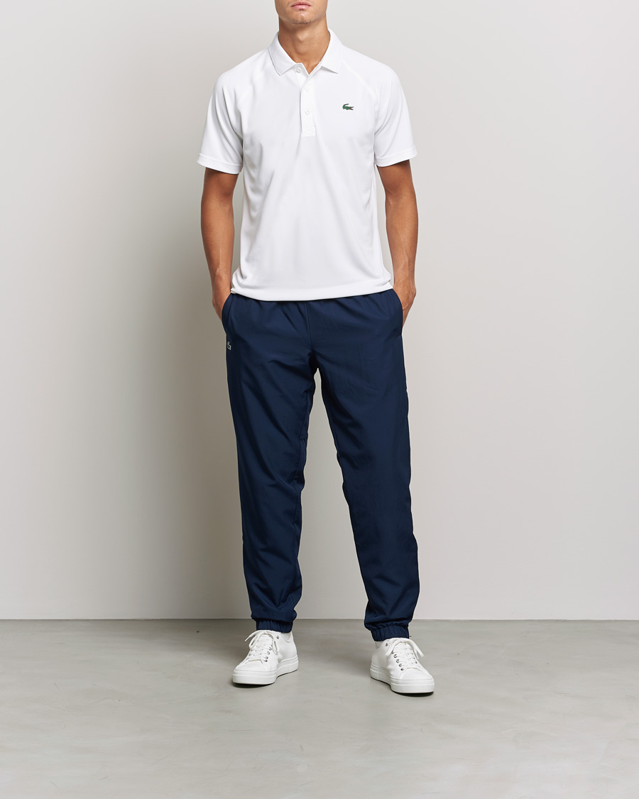 Herre |  | Lacoste Sport | Performance Ribbed Collar Polo White