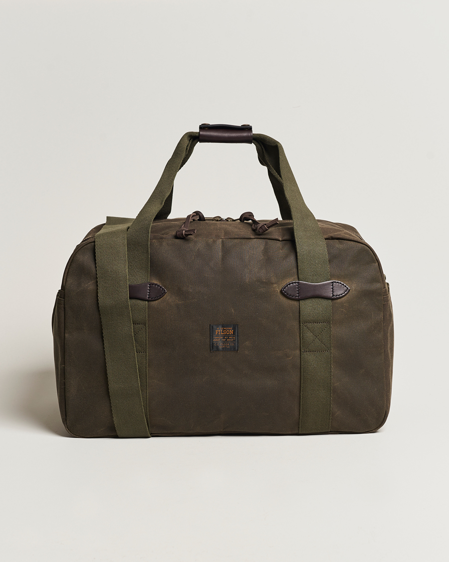 Shop the Barbour Explorer Wax Duffle Bag in Olive