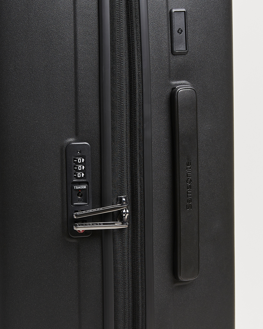Herre | Tasker | Samsonite | Restackd Spinner Check-In Black