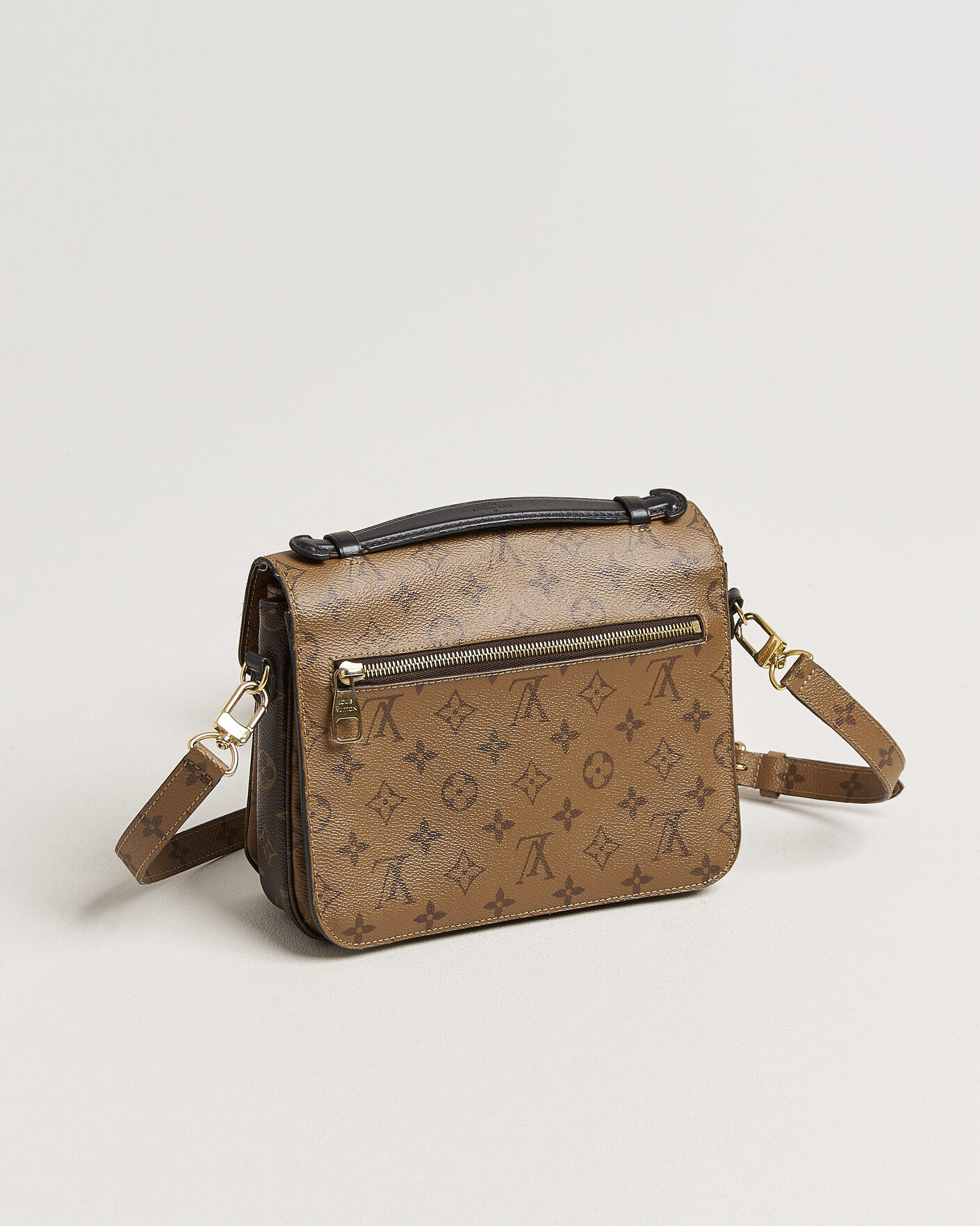 Herre | Pre-Owned & Vintage Bags | Louis Vuitton Pre-Owned | Pochette Métis Reverse Monogram