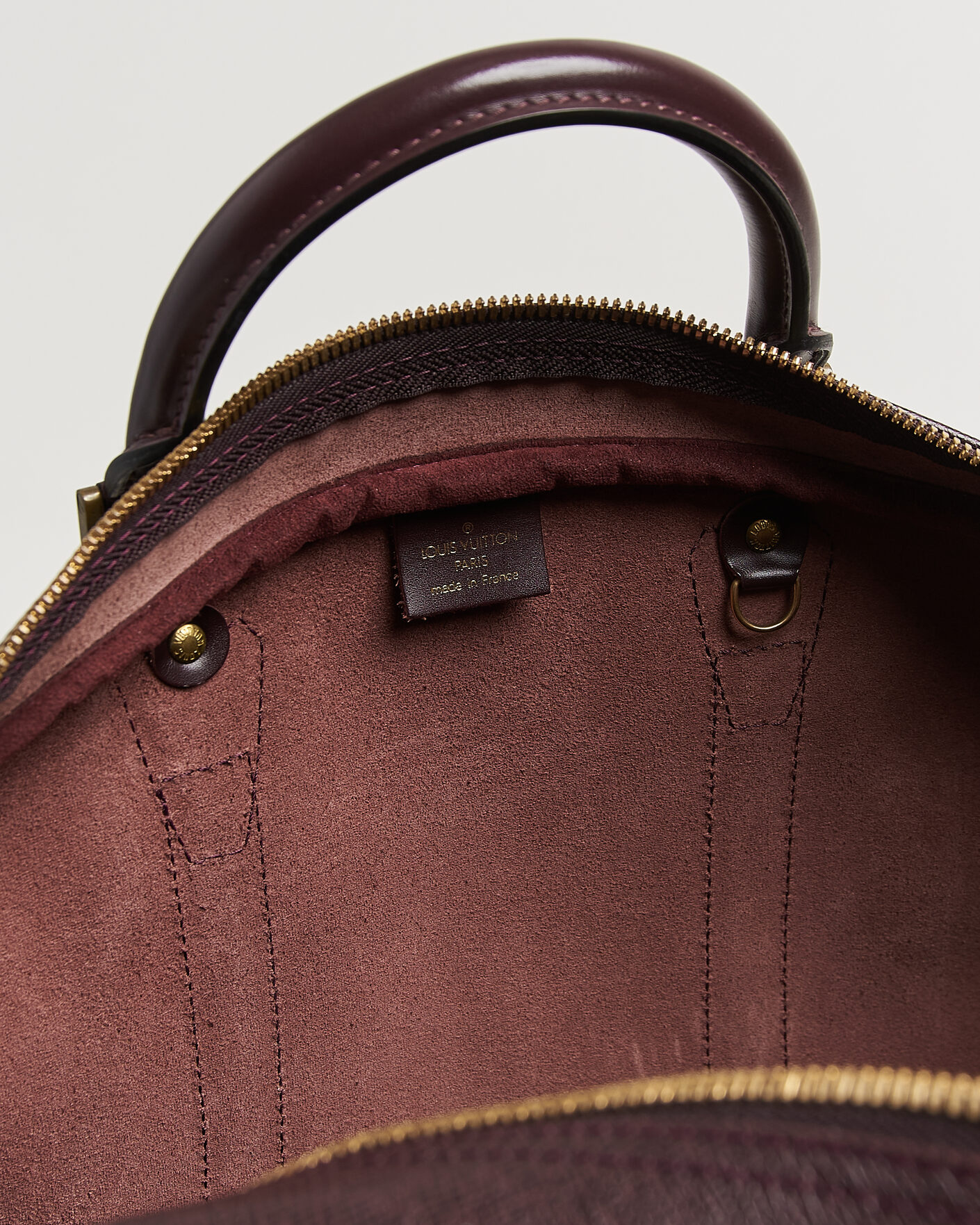 Herre | Pre-Owned & Vintage Bags | Louis Vuitton Pre-Owned | Taiga Kendall Weekend Bag PM Burgundy