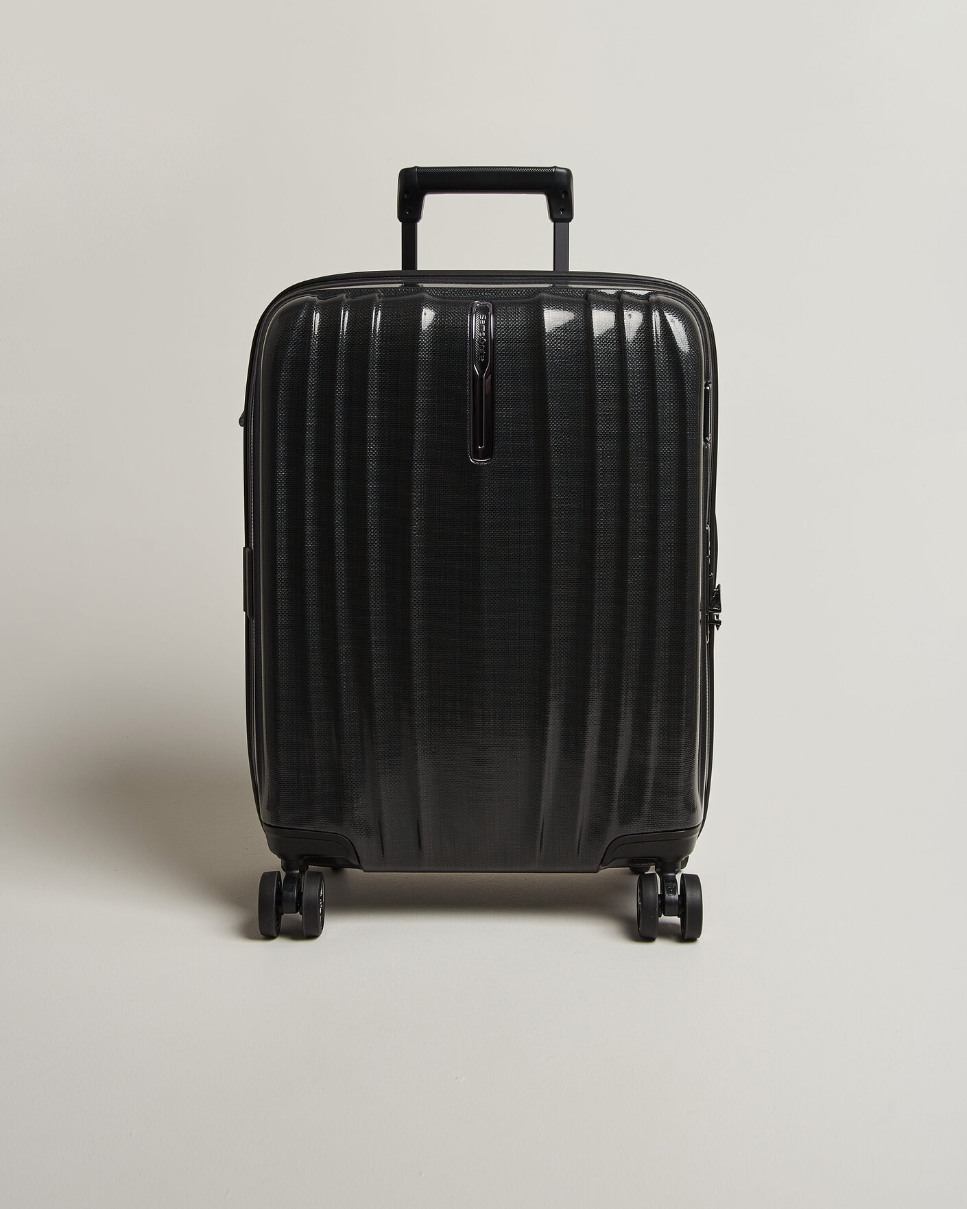 Herre | Tasker | Samsonite | Nexis Spinner Carry-On Onyx Black