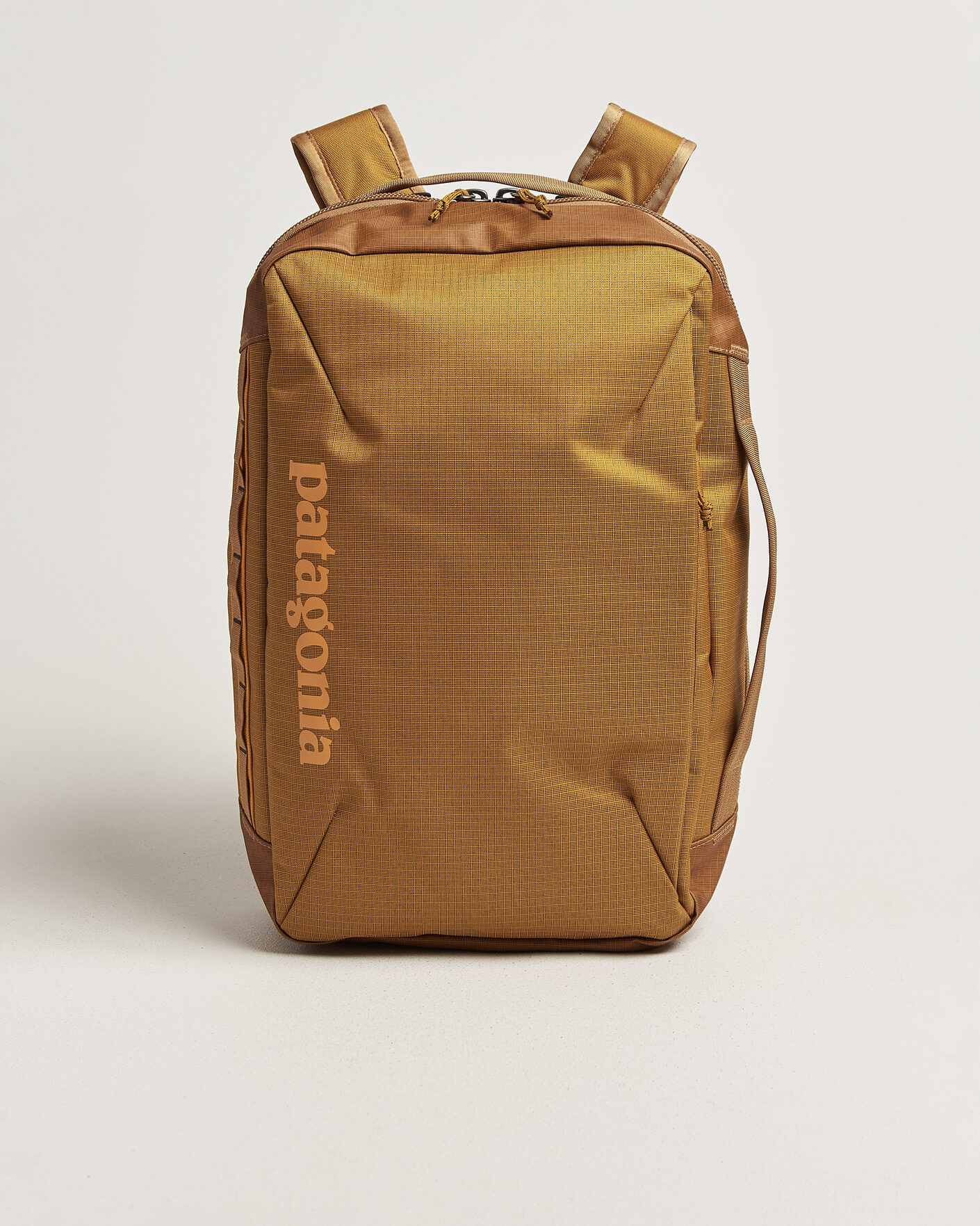 Herre | Tasker | Patagonia | Black Hole Micro MLC Cinnamon Brown