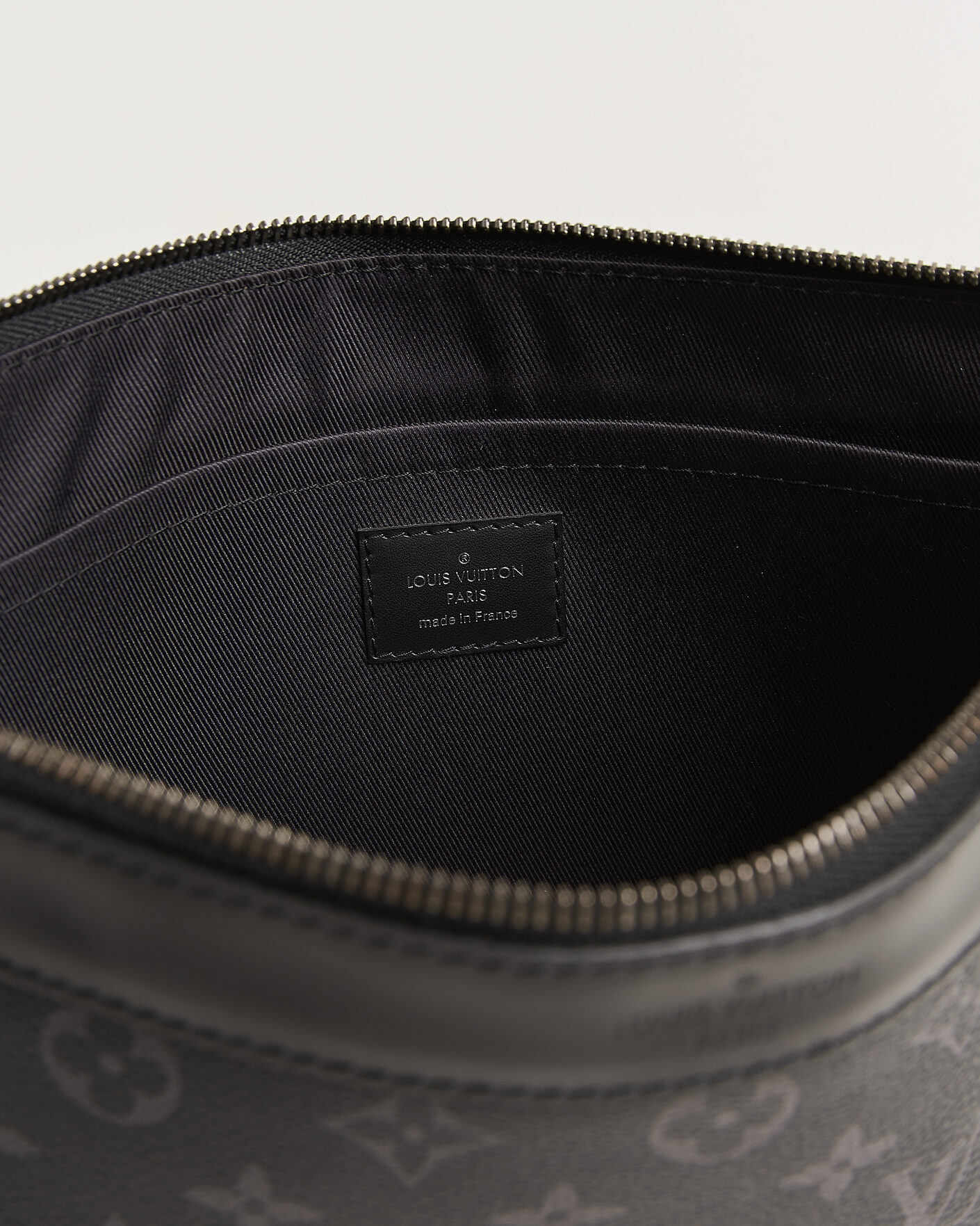 Herre | Pre-Owned & Vintage Bags | Louis Vuitton Pre-Owned | Discovery Pochette Monogram Eclipse